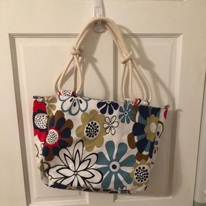 Canvas bag with rope handles.  Very cute floral bag.